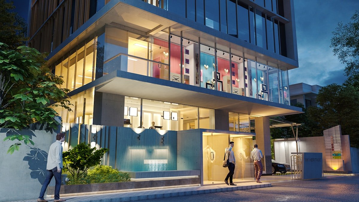 Modern luxury building entrance at dusk, Northern Lights by Puravankara